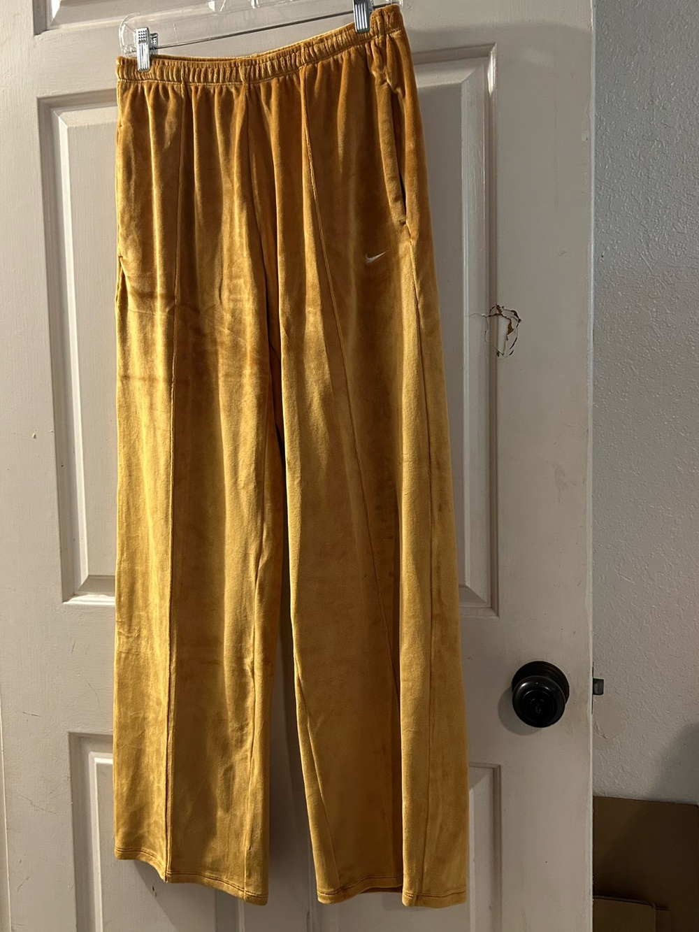 Nike Women's Velvet Joggers in Mustard Yellow